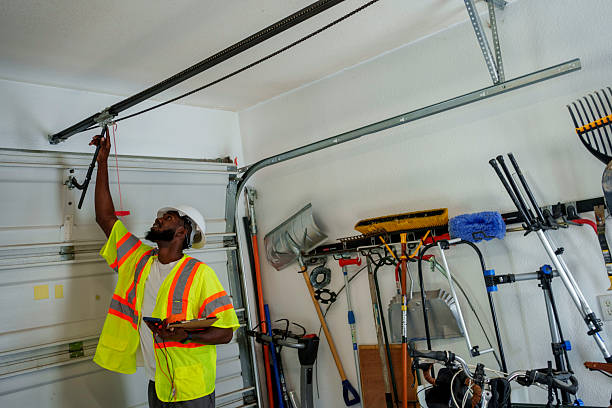 Professional Garage Door Panel Replacement technician working in Peoria Heights, IL